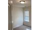 Cozy bedroom featuring a window letting in natural light at 7981 Gossamer Dr, Fairburn, GA 30213