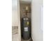 Water heater in the utility room, which has recently been inspected at 7981 Gossamer Dr, Fairburn, GA 30213