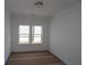 Bedroom with two windows and neutral paint at 2012 Ripple Park Bnd, Canton, GA 30114