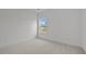 Bright and neutral carpeted bedroom, complemented by a large window at 2012 Ripple Park Bnd, Canton, GA 30114