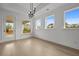 Dining room featuring windows, natural light, and hardwood flooring at 2012 Ripple Park Bnd, Canton, GA 30114