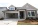 Charming single-Gathering home with a two-car garage and stone accents at 2012 Ripple Park Bnd, Canton, GA 30114