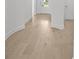 Elegant hardwood flooring in a modern home with white trim and baseboards at 2012 Ripple Park Bnd, Canton, GA 30114