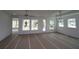 Spacious living room with natural light and modern ceiling fan at 2012 Ripple Park Bnd, Canton, GA 30114