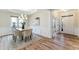 Bright dining room features a chandelier and seating for six at 1540 Cloverleaf Pl, Cumming, GA 30041