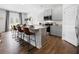 Modern kitchen with gray cabinets, granite countertops, and stainless steel appliances at 8238 Walnut Hall Dr, Fairburn, GA 30213