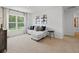 Comfortable sitting area with a sectional sofa and large window at 8238 Walnut Hall Dr, Fairburn, GA 30213