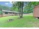 Backyard view of home and storage shed at 1167 Mcclung Rd, Hiram, GA 30141