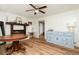 Bright dining area with wood flooring and a fireplace at 1167 Mcclung Rd, Hiram, GA 30141