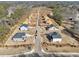 Aerial view of a new construction neighborhood featuring single-Gathering homes and tree-lined streets at 1421 Stephens View Dr, Loganville, GA 30052