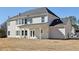 Exterior of home showing a covered patio and spacious backyard at 1421 Stephens View Dr, Loganville, GA 30052