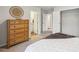 Bedroom with wood dresser and view of bathroom at 1421 Stephens View Dr, Loganville, GA 30052