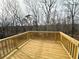 View of new wooden deck and backyard at 5547 Bent Grass Way, Douglasville, GA 30135