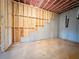 Unfinished basement featuring wood frame, exposed insulation, plumbing and cement foundation at 5547 Bent Grass Way, Douglasville, GA 30135