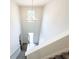 High ceiling entryway with a chandelier and a large window above the front door at 5547 Bent Grass Way, Douglasville, GA 30135