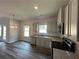 Modern kitchen with granite countertops and gray cabinets at 5547 Bent Grass Way, Douglasville, GA 30135