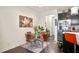 Small dining area with glass table and four chairs at 7711 Cabrini Pl, Fairburn, GA 30213