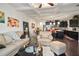 Open living room with view into kitchen and dining area at 7711 Cabrini Pl, Fairburn, GA 30213