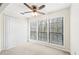 Spacious bedroom with large windows and ceiling fan at 2776 Vinings Central Se Dr # 19, Atlanta, GA 30339