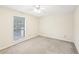 Spacious bedroom with ceiling fan and window at 2776 Vinings Central Se Dr # 19, Atlanta, GA 30339