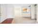 Entryway with wood floors and views into the living room and kitchen at 2776 Vinings Central Se Dr # 19, Atlanta, GA 30339