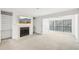 Bright living room featuring a fireplace and built-in shelving at 2776 Vinings Central Se Dr # 19, Atlanta, GA 30339