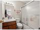 Bathroom with shower/tub combo and wood vanity at 366 Oak Harbor Trl, Marietta, GA 30066