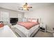 Spacious bedroom with TV and ceiling fan at 366 Oak Harbor Trl, Marietta, GA 30066