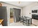 Kitchen dining area with sliding glass door to deck at 366 Oak Harbor Trl, Marietta, GA 30066