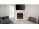 Living room fireplace with a mounted TV above at 366 Oak Harbor Trl, Marietta, GA 30066