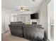 Living room with fireplace, TV, and gray couches at 366 Oak Harbor Trl, Marietta, GA 30066