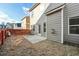 Small backyard with a concrete patio and wooden fence at 5105 Deepwater Cv, Acworth, GA 30101