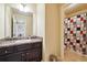Small bathroom with single vanity and shower/tub combo at 5105 Deepwater Cv, Acworth, GA 30101