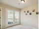 Bright bedroom with double doors leading to a private balcony at 5105 Deepwater Cv, Acworth, GA 30101