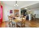 Dining room with hardwood floors and wood furniture at 5105 Deepwater Cv, Acworth, GA 30101