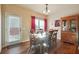 Bright dining room with hardwood floors and access to patio at 5105 Deepwater Cv, Acworth, GA 30101