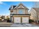 Two-story house with stone accents and a two-car garage at 5105 Deepwater Cv, Acworth, GA 30101