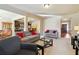 Open living room with view into kitchen and entryway at 5105 Deepwater Cv, Acworth, GA 30101