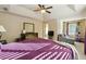 Large main bedroom with sitting area and a TV at 5105 Deepwater Cv, Acworth, GA 30101