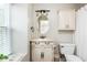 Charming bathroom with updated vanity and window at 12 Independence Nw Pl # 12, Atlanta, GA 30318
