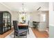 Bright dining room with hardwood floors and a rustic wooden table at 12 Independence Nw Pl # 12, Atlanta, GA 30318