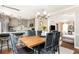 Open concept dining area adjacent to a modern kitchen at 12 Independence Nw Pl # 12, Atlanta, GA 30318