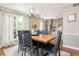 Elegant dining room with a large table and kitchen views at 12 Independence Nw Pl # 12, Atlanta, GA 30318
