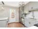 Modern kitchen with gray cabinets, stainless steel appliances and backyard access at 12 Independence Nw Pl # 12, Atlanta, GA 30318