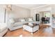 Spacious living room featuring hardwood floors and a comfortable sectional sofa at 12 Independence Nw Pl # 12, Atlanta, GA 30318