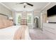 Bright main bedroom with large windows, plush carpet, and plenty of space at 12 Independence Nw Pl # 12, Atlanta, GA 30318