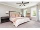Spacious main bedroom with ample natural light and plush carpet at 12 Independence Nw Pl # 12, Atlanta, GA 30318