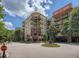 Attractive building exterior with balconies and landscaping at 200 River Vista Dr # 405, Atlanta, GA 30339