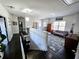 Upstairs hallway with dark hardwood floors and access to bedrooms at 1690 Geranium Ln, Cumming, GA 30040