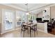 Bright breakfast nook with table and chairs, located near the kitchen at 3648 Ramsey Close Sw, Atlanta, GA 30331